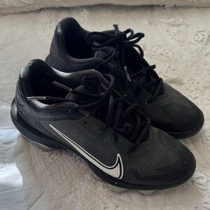 Nike Men’s Black Athletic Shoes with White Swoosh Accent